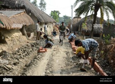 rural-development-the-rural-villagers-are-constructed-their-own-village-road-with-bricks-for-developing-their-life-style-and-communication-2B8CEH5